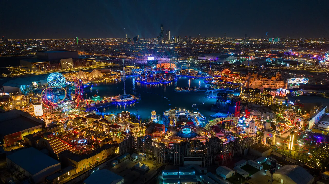 Boulevard World in Riyadh glowing with colourful lights at night